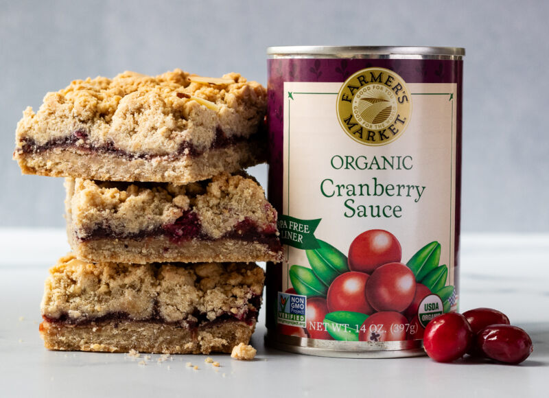Gluten-Free Cranberry Almond Crumble Bars with a can of cranberry sauce